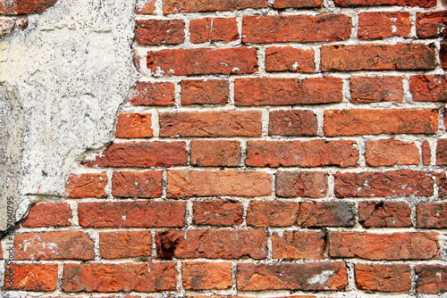Old red brick wall background or texture