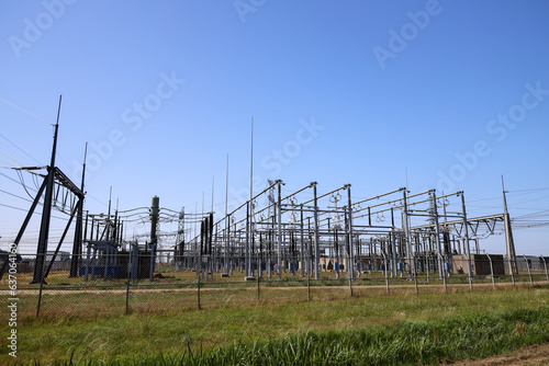 High voltage powerlines of Tennet at powerstation Hessenweg in Zwolle photo