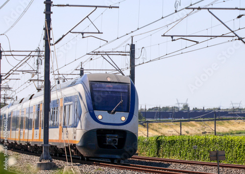 SLT commuter train on railroad track near Zwolle