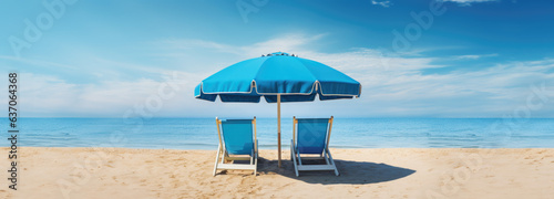 Sunlit Sandy Beach with Turquoise Sea, Umbrella, and Chair