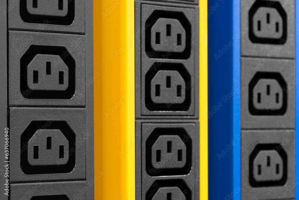 Electricity sockets IEC 60320 C13 in the server rack. Electicity sockets (Iin the server rack as technology style concept background as template, page or web banner Electricity sockets IEC 60320 C13 in the server rack. Electicity sockets (Iin the server rack as technology style concept background as template, page or web banner