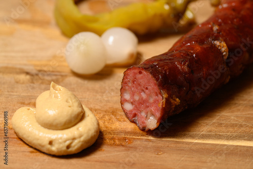 Grilled Kasekrainer or Cheese Kransky Austrian Sausage with Pickled Onions and Hot Pepper