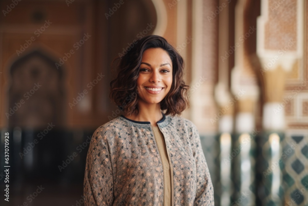 Fototapeta premium Portrait of a beautiful african american woman at the mosque