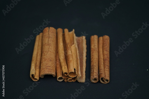 Cinnamon sticks on black background ,  photo