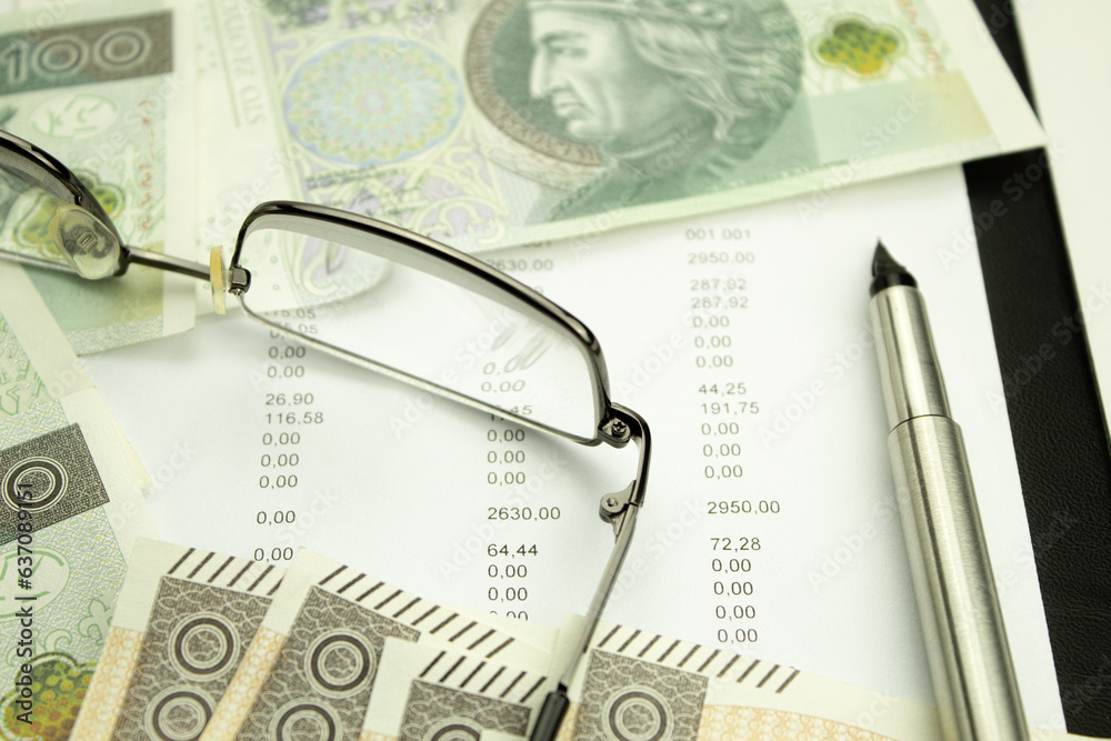 Money and receipts on the table, glasses with business papers Money and receipts on the table, glasses with business papers