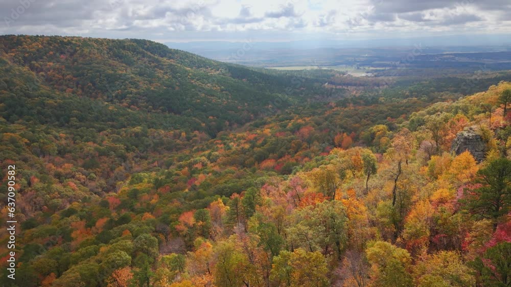 Scenic Mountain view during autumn in Arkansas Ozark country with fall forest via drone aerial 