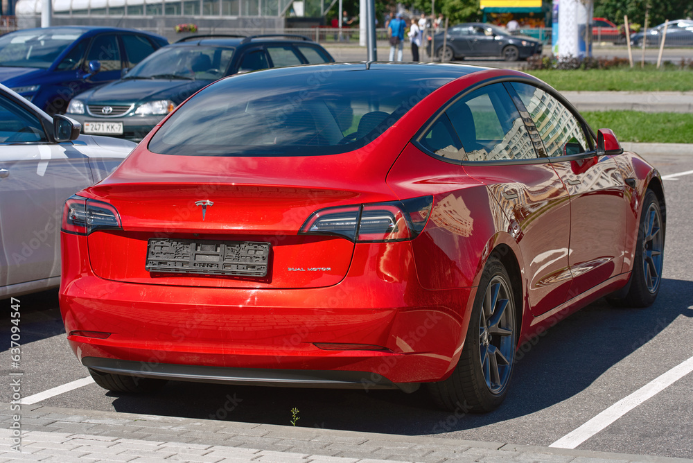 Minsk, Belarus. Aug 13, 2023. Red Tesla Model 3 rear view. Electric car
