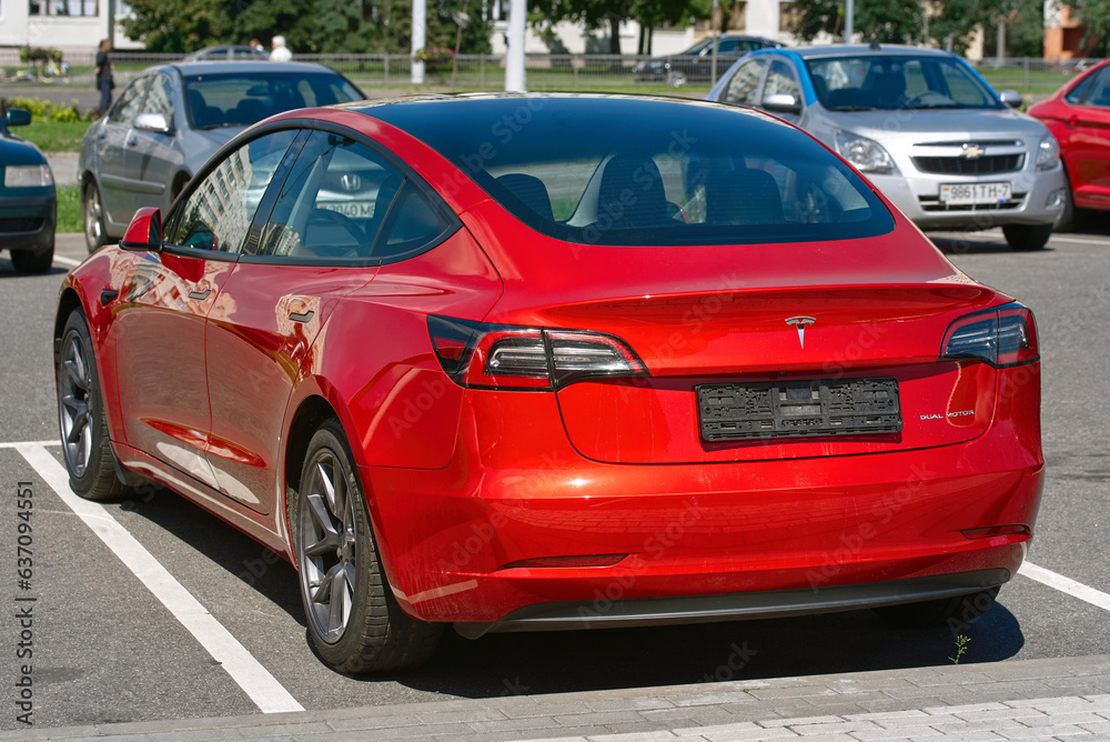Minsk, Belarus. Aug 13, 2023. Red Tesla Model 3 rear view. Electric car