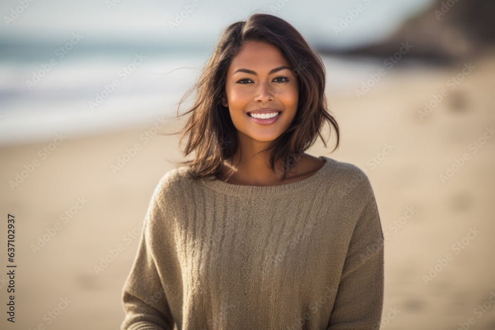 Group portrait of an Indian woman in her 30s in a beach Group portrait of an Indian woman in her 30s in a beach
