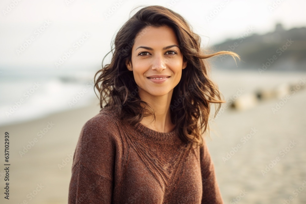 Group portrait of an Indian woman in her 30s in a beach Group portrait of an Indian woman in her 30s in a beach