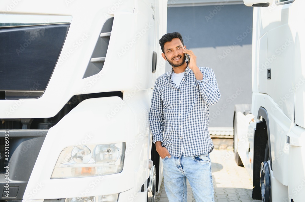 Portrait of confident indian truck driver on parking. Copy space. Portrait of confident indian truck driver on parking. Copy space.