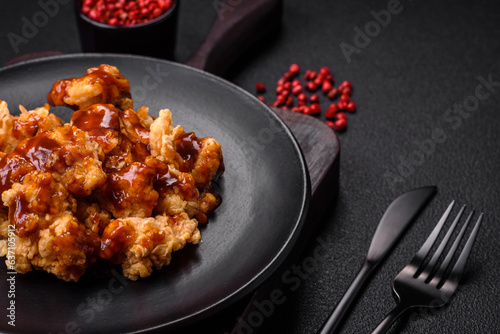 Delicious juicy grilled chicken meat bites with salt, spices and herbs