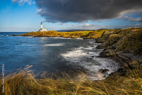 Stormy day at Turnberry Lighthouse and Golf course on the Ayrshire coast in Scotland photo