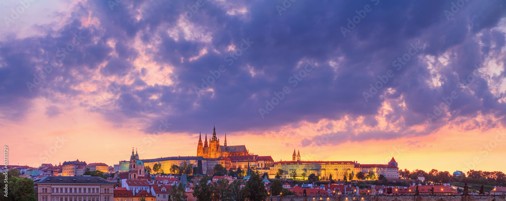 Cityscape at sunset, panorama, banner - view of the historical district of Hradcany with the castle complex Prague Castle, Prague, Czech Republic