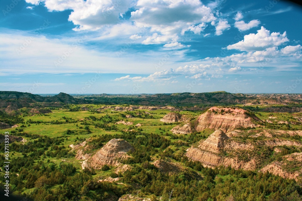 Picturesque valley with cliffs surrounded by lush greenery. Painted Canyon, USA.