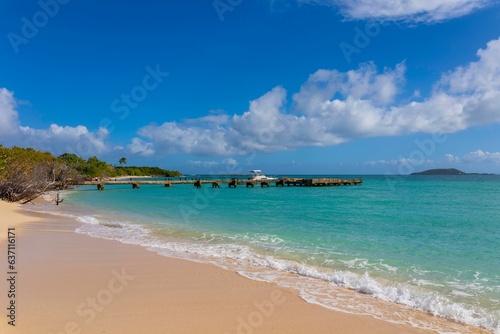Picturesque beach with white sand and crystal clear turquoise water