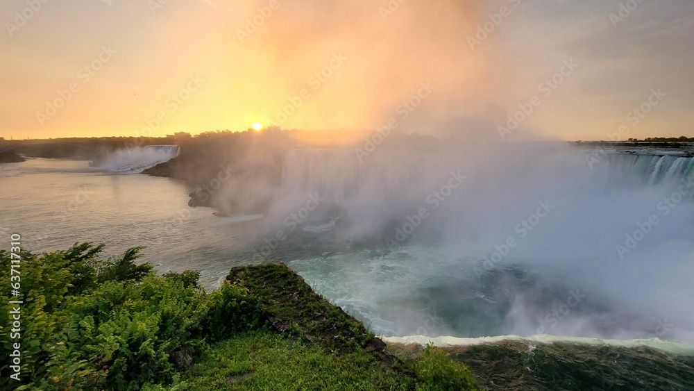 Mesmerizing Horseshoe Falls with water spray and splashes at sunrise
