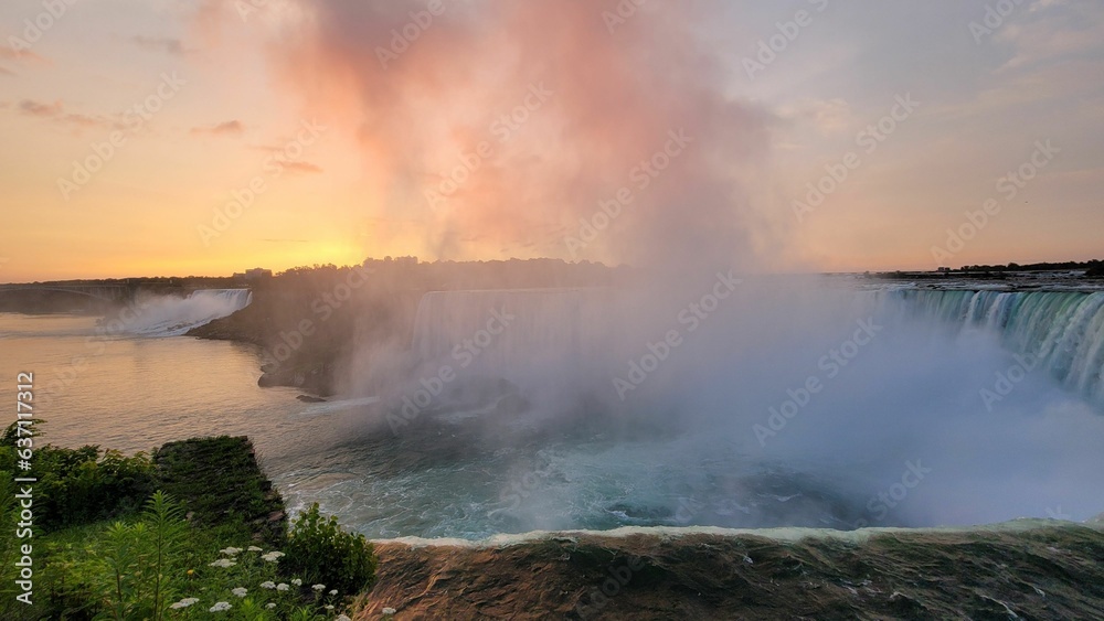 Scenic view of Niagara Falls in Canada at golden sunrise