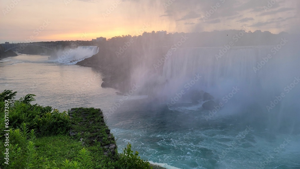 Scenic view of Niagara Falls in Canada at golden sunrise Scenic view of Niagara Falls in Canada at golden sunrise