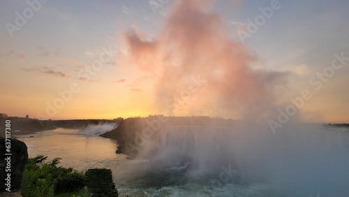 Scenic view of Niagara Falls in Canada at golden sunrise © Alejandro Montemayor/Wirestock Creators
