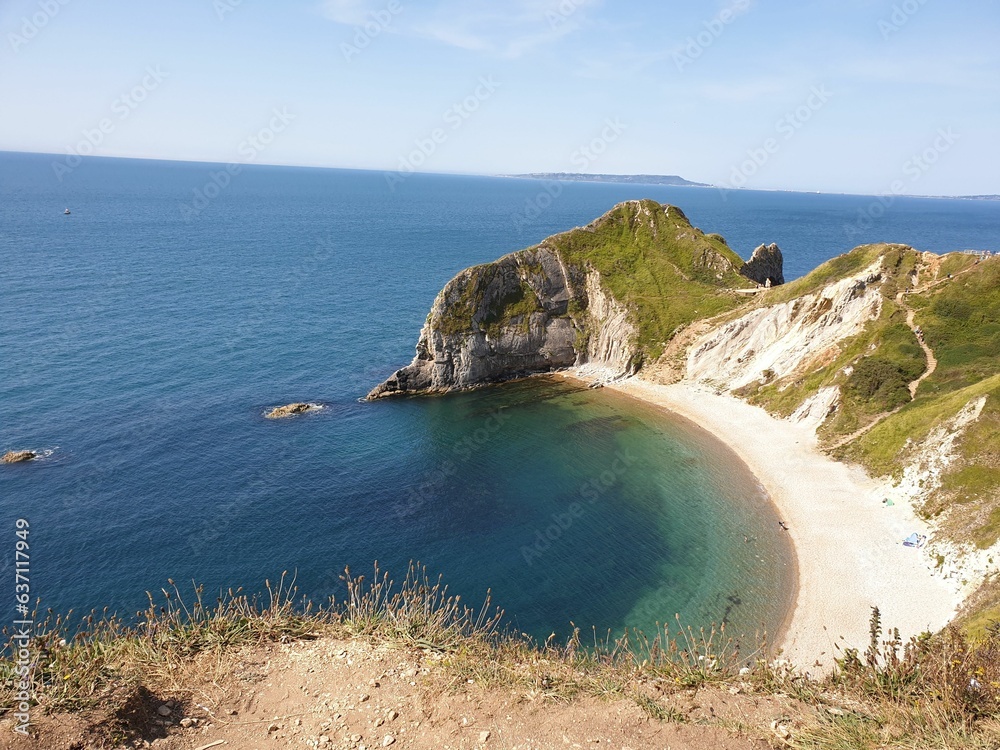 Fototapeta premium Aerial view of a beautiful sea near the mountains in England, UK