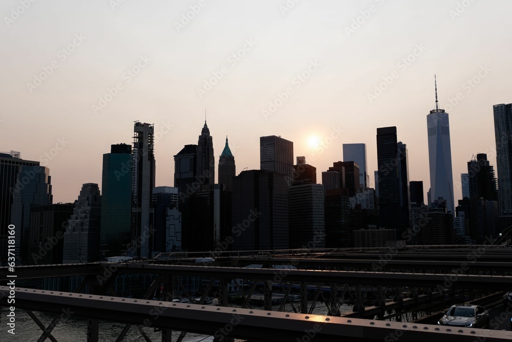 Stunning view of the Lower Manhattan skyline, illuminated by the sunset