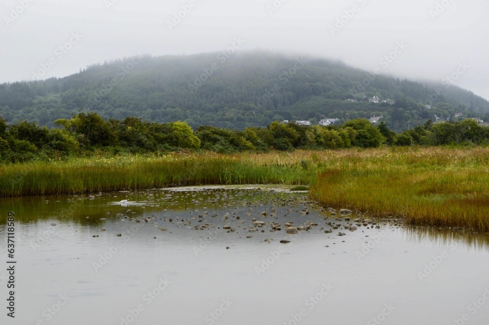 Lake with hills in the background Lake with hills in the background