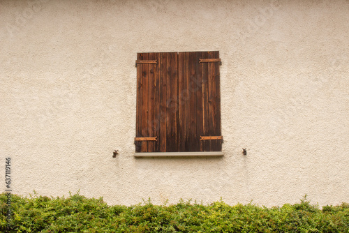 antique window with wooden doors 