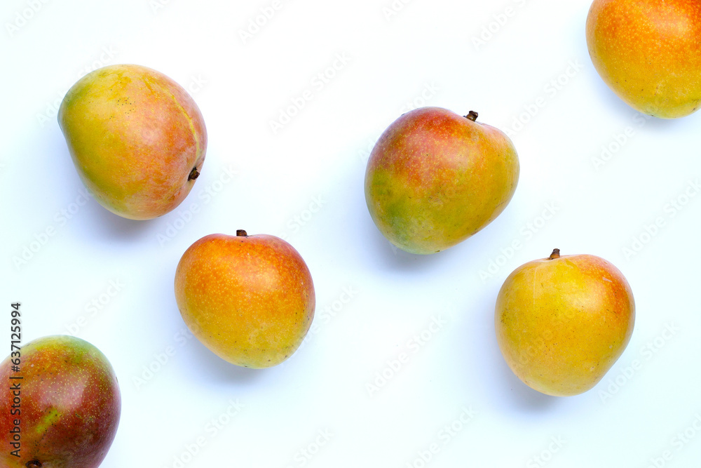 Tropical fruit, Mango on white background. Top view Tropical fruit, Mango on white background. Top view