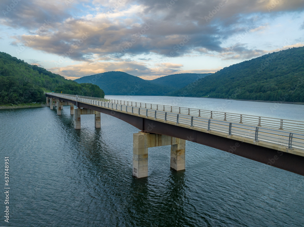 Late afternoon summer aerial photo of the bridge over the Cannonsville Reservoir, Trout Creek, Route 10. Late afternoon summer aerial photo of the bridge over the Cannonsville Reservoir, Trout Creek, Route 10.