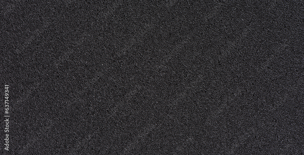 Black soft foam board background. black sponge surface texture.