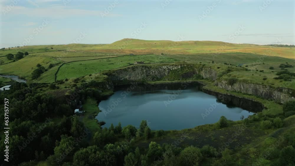 Establishing Drone Shot Over Disused Quarry at Golden Hour in Yorkshire Dales Establishing Drone Shot Over Disused Quarry at Golden Hour in Yorkshire Dales