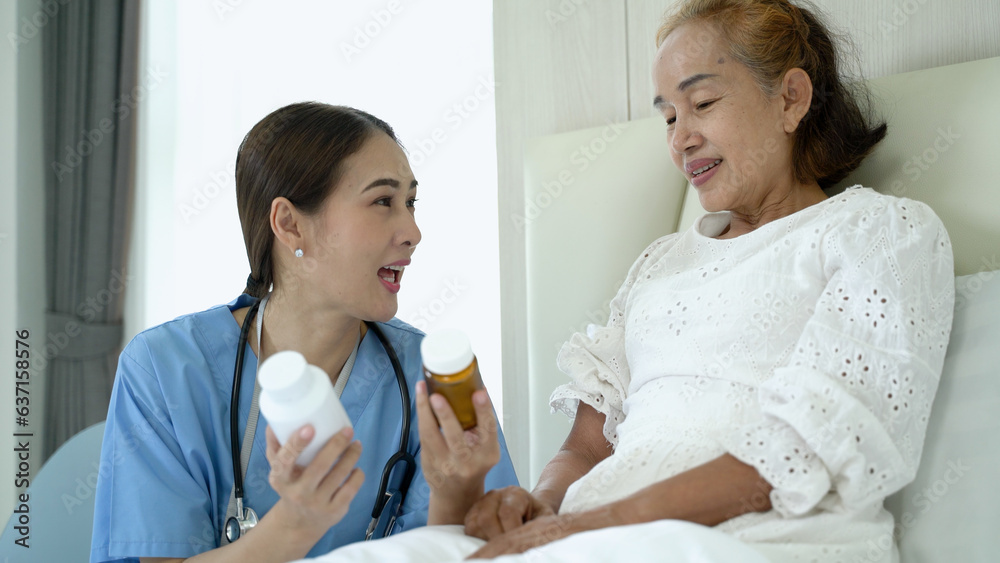 Nurse is explaining taking the medicine and consulting for treatment. Concept of wellness consultation, caregiver, elderly healthcare and homeopathic doctor. Nurse is explaining taking the medicine and consulting for treatment. Concept of wellness consultation, caregiver, elderly healthcare and homeopathic doctor.