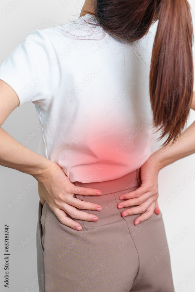 adult female with muscle pain on gray background. Elderly woman having back body ache due to Piriformis Syndrome, Low Back Pain and Spinal Compression. Office syndrome and medical concept adult female with muscle pain on gray background. Elderly woman having back body ache due to Piriformis Syndrome, Low Back Pain and Spinal Compression. Office syndrome and medical concept