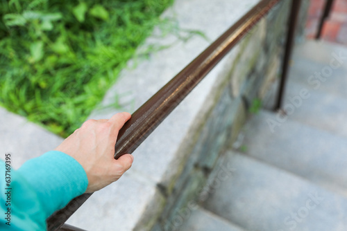 handrail signifies safety and support, guiding us through life's pathways with stability and reassurance © Your Hand Please