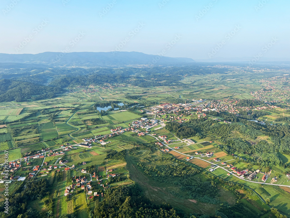 View of forests, fields, villages and Zagorje hills, during a panoramic balloon flight over Croatian Zagorje - Croatia (Panoramski let balonom iznad Hrvatskog zagorja - Hrvatska) View of forests, fields, villages and Zagorje hills, during a panoramic balloon flight over Croatian Zagorje - Croatia (Panoramski let balonom iznad Hrvatskog zagorja - Hrvatska)
