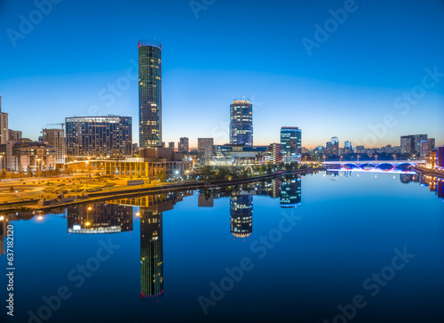 Yekaterinburg city and pond aerial panoramic view at summer or early autumn night. Night city in the early autumn or summer. © Dmitrii Potashkin