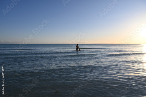 silhouette of a dad and kid