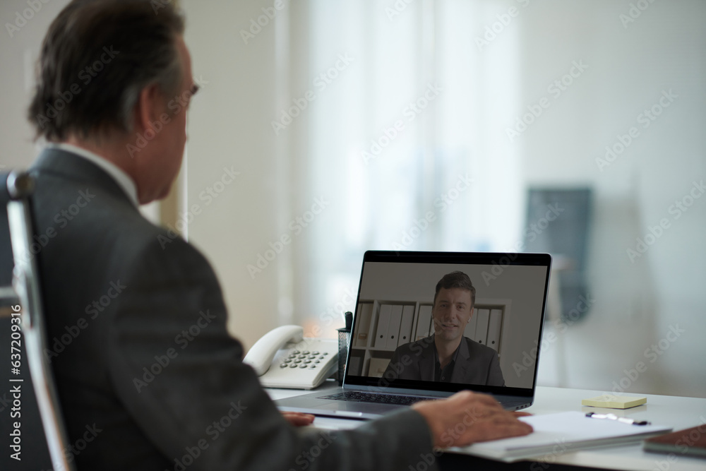 Entrepreneur video calling coworker to discuss various important issues Entrepreneur video calling coworker to discuss various important issues