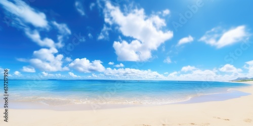 Sandy beach, blue sky and tropical sea.