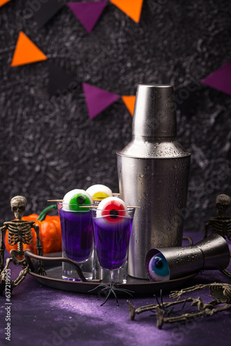 Halloween purple cocktail with eyes.