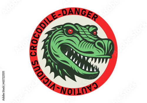 Vector scary green terrible toothy reptile with open maw. Inscription in a circle, Caution vicious crocodile danger. White isolated background. Round sticker or icon.