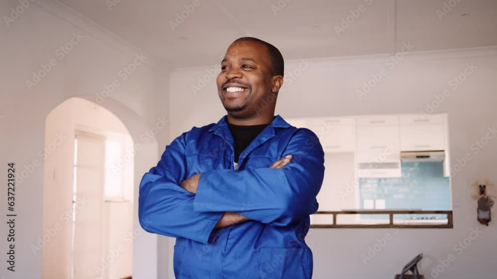 Medium Shot of a Black Man in Overalls Standing Inside Medium Shot of a Black Man in Overalls Standing Inside
