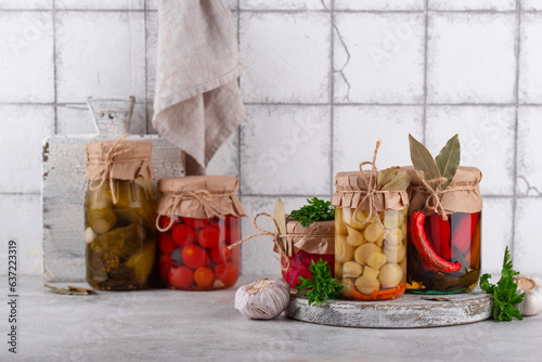 Pickled vegetables in glass jars.