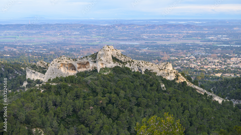 Massive rock formation in the Alpilles on a sunny day Massive rock formation in the Alpilles on a sunny day