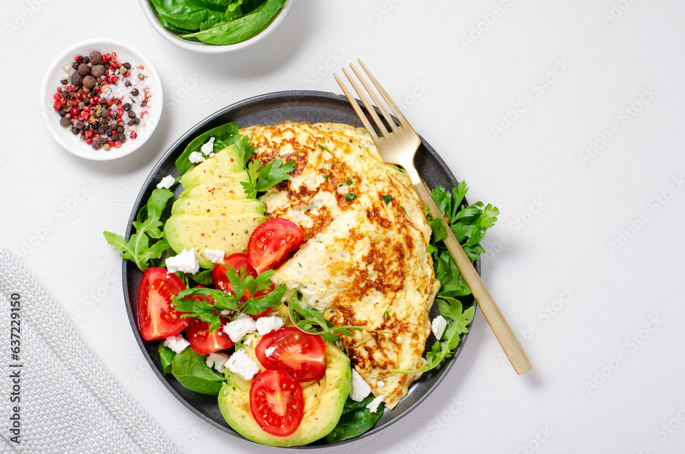 Omelette Served with Avocado and Cherry Tomatoes, Healthy Breakfast Omelette Served with Avocado and Cherry Tomatoes, Healthy Breakfast