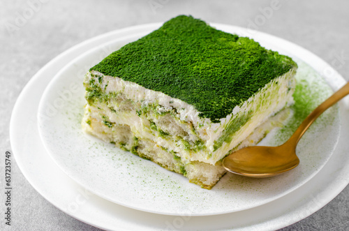 Matcha Tiramisu, Italian Tiramisu Cake with Matcha Green Tea on Concrete Background