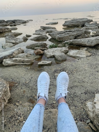 sneakers on the traveler's sea