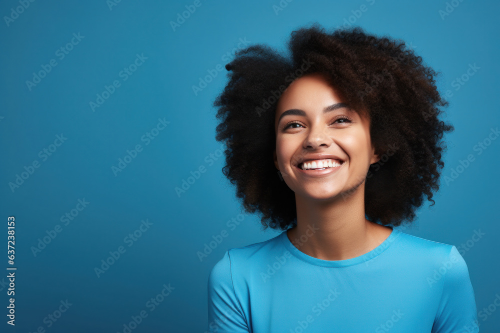 Portrait of a Woman Smiling Looking Up Black Woman Blue Background Portrait of a Woman Smiling Looking Up Black Woman Blue Background