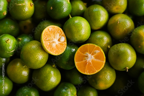 Calamansi oranges on a white background